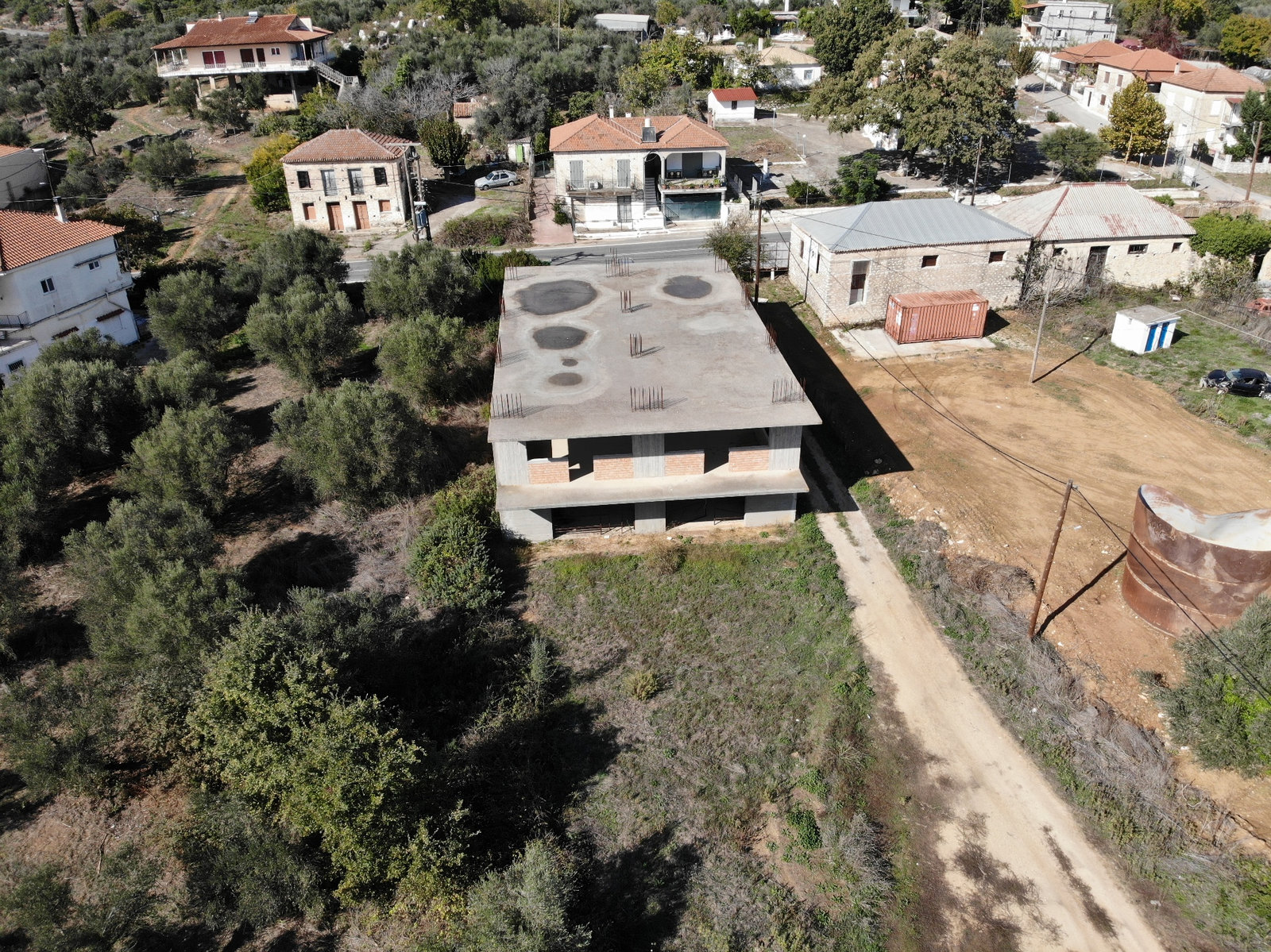 aerial-unfinished-building-kazarma-village-id342011.jpg Πολυκατοικία/Κτίριο – 700 τ.μ. – Καζάρμα – Βουφράδα